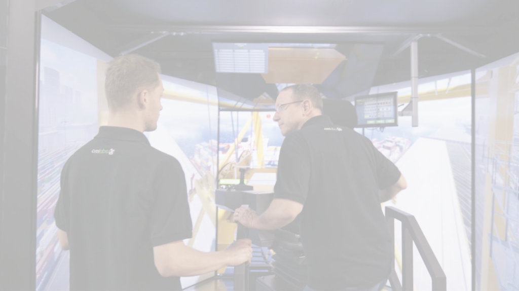 Operator and instructor in front of the MasterCab Simulator